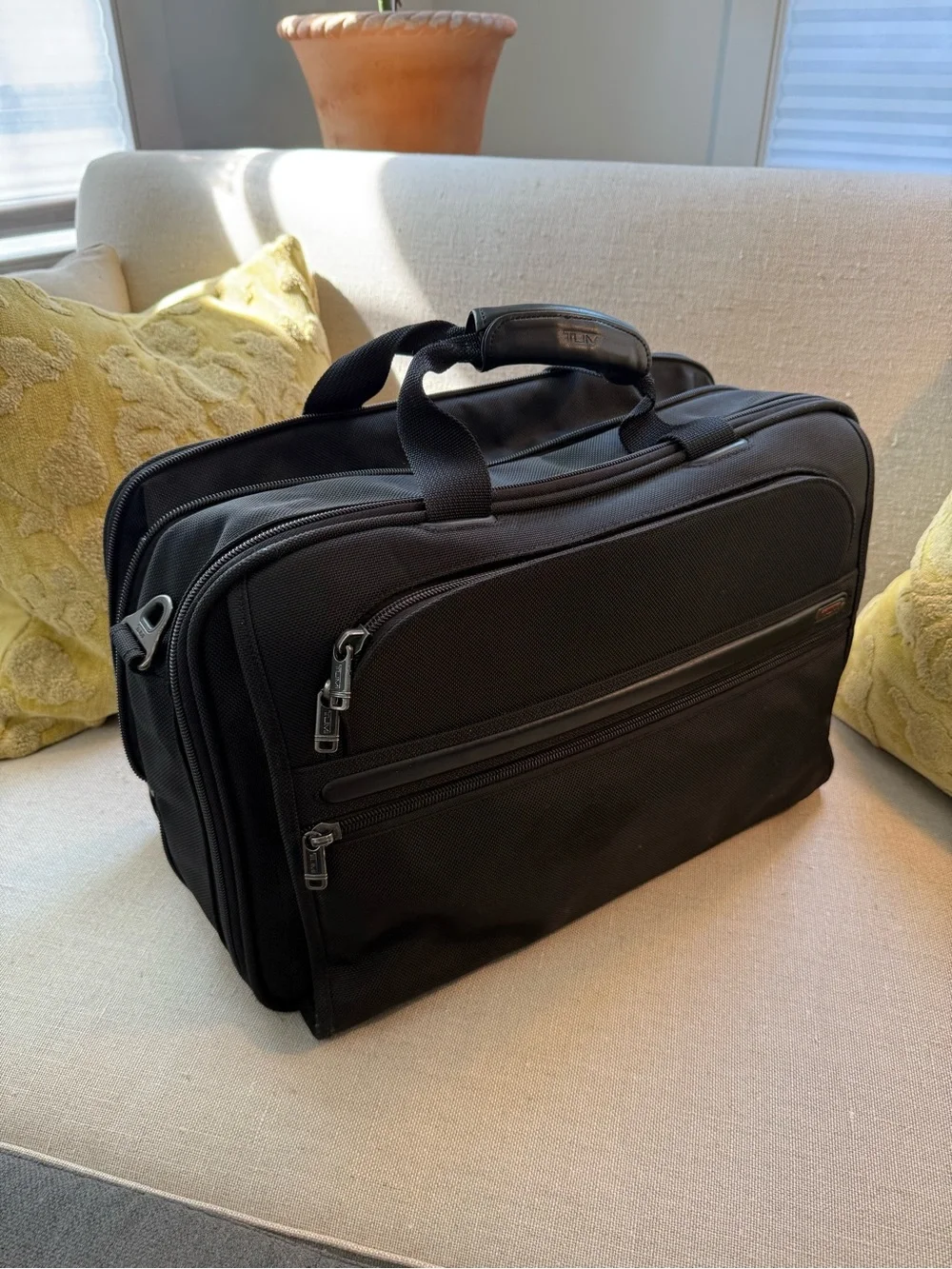 Black Men's Tumi Alpha expandable travel briefcase. Large.